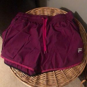 Women’s FILA athletic shorts, size medium.